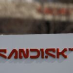 Saham-Saham dengan Pergerakan Terbesar Sebelum Pasar Dibuka: MU, SNDK, NEM