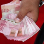 Rupiah Tertekan Melawan Dolar Singapura, Apa yang Terjadi di Pasar?