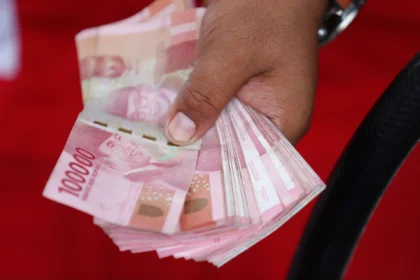 Rupiah Tertekan Melawan Dolar Singapura, Apa yang Terjadi di Pasar?