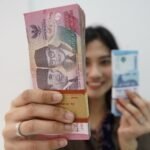 Rupiah Tertekan, Hampir Sentuh Rp 18.200 per Dolar AS